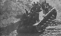 German infantry with light machine guns on assault guns.