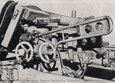 [Figure 67. Gunner's position on 5-cm Pak, showing traversing and elevating handwheels.]